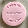 Close-up of embossed fondant cookie with custom text