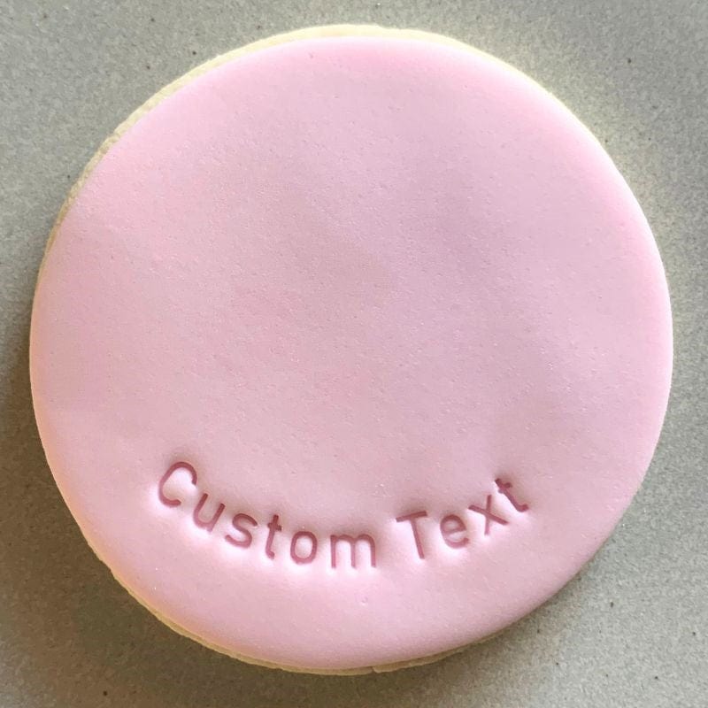 Bottom curve custom text stamp creating personalized cookies