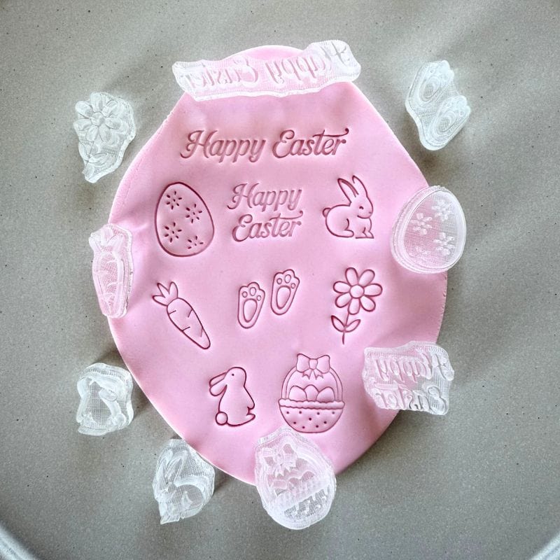 Close-up of Easter-themed cookie stamps, perfect for decorating fondant cookies this spring.