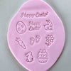 Easter cookie decorating tools featuring premium mini stamps with bunnies, eggs, and flowers.