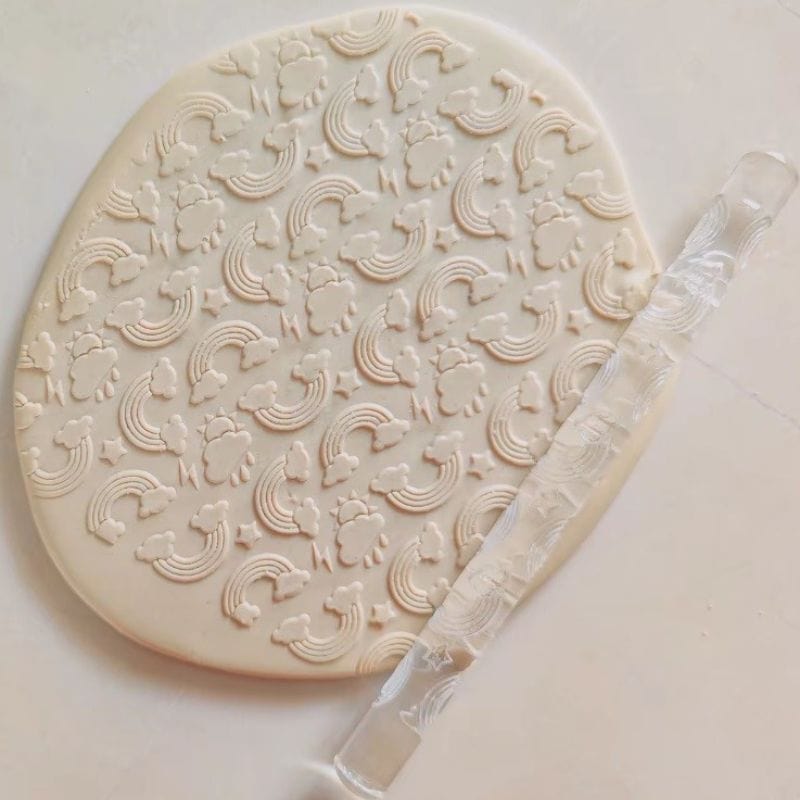 Textured rolling pin for rainbow cloud design cookies