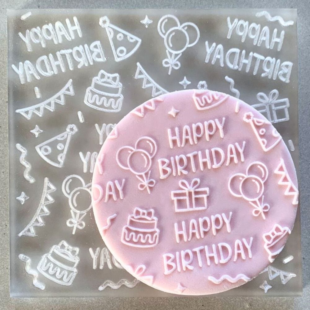 Cookie with Happy Birthday Party pattern created using an acrylic fondant debosser.