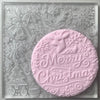 Magical Merry Christmas Reindeer embosser stamp with festive details on a round fondant cookie