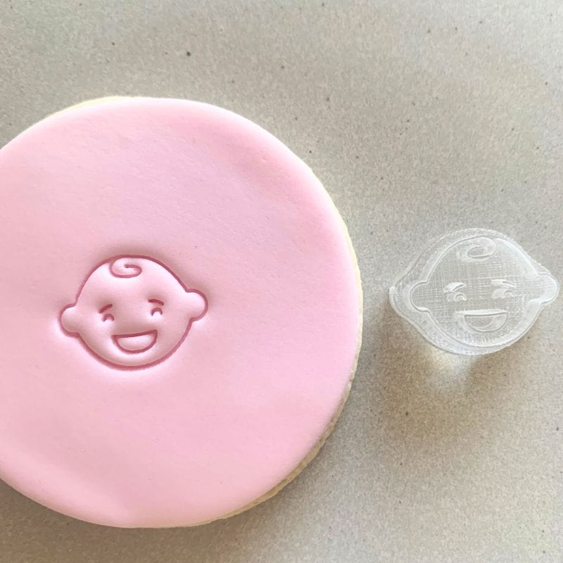 Mini cookie stamp creating baby boy fondant decoration