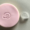 Mini Beach Shell Cookie Stamp used to create decorated fondant cookie