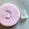 Mini Bride and Groom Cookie Stamp used to create decorated fondant cookie