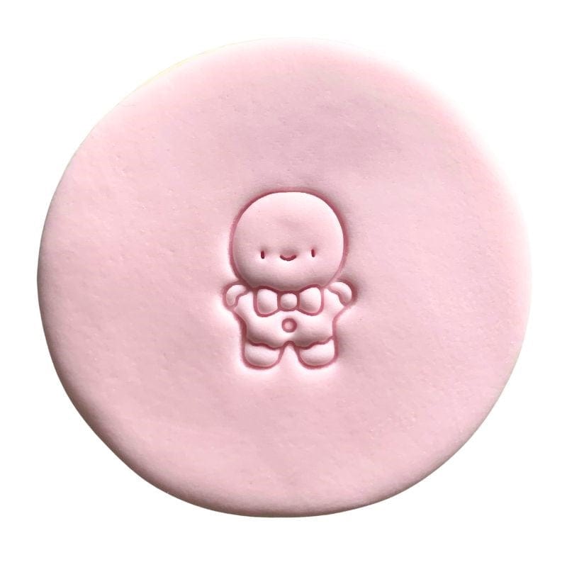 fondant cookie with Merry Christmas gingerbread man stamp design