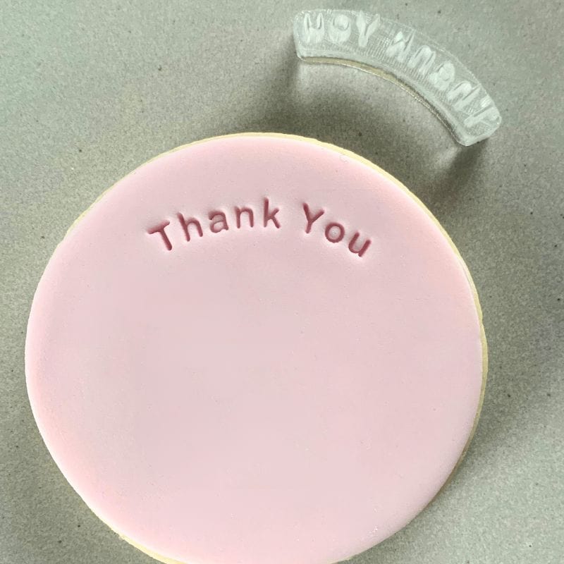 Mini Curved Thank You Cookie Stamp used to create decorated fondant cookie