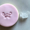 Mini Cute Crab Cookie Stamp used to create decorated fondant cookie