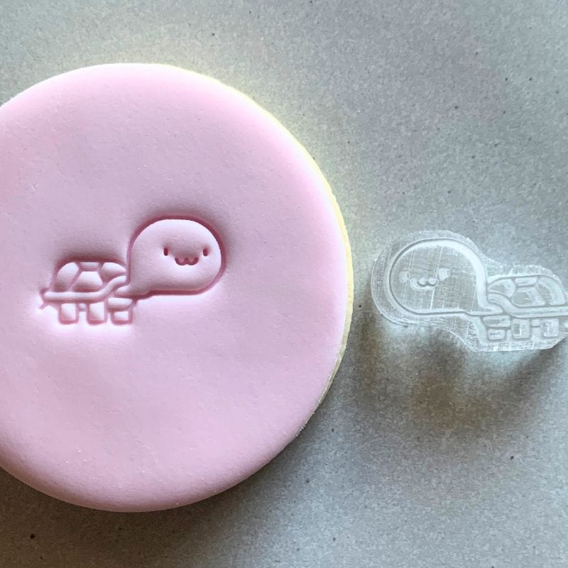 Mini Cute Turtle Cookie Stamp used to create decorated fondant cookie.