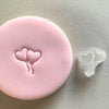 Mini Heart Balloon Cookie Stamp used to create decorated fondant cookie