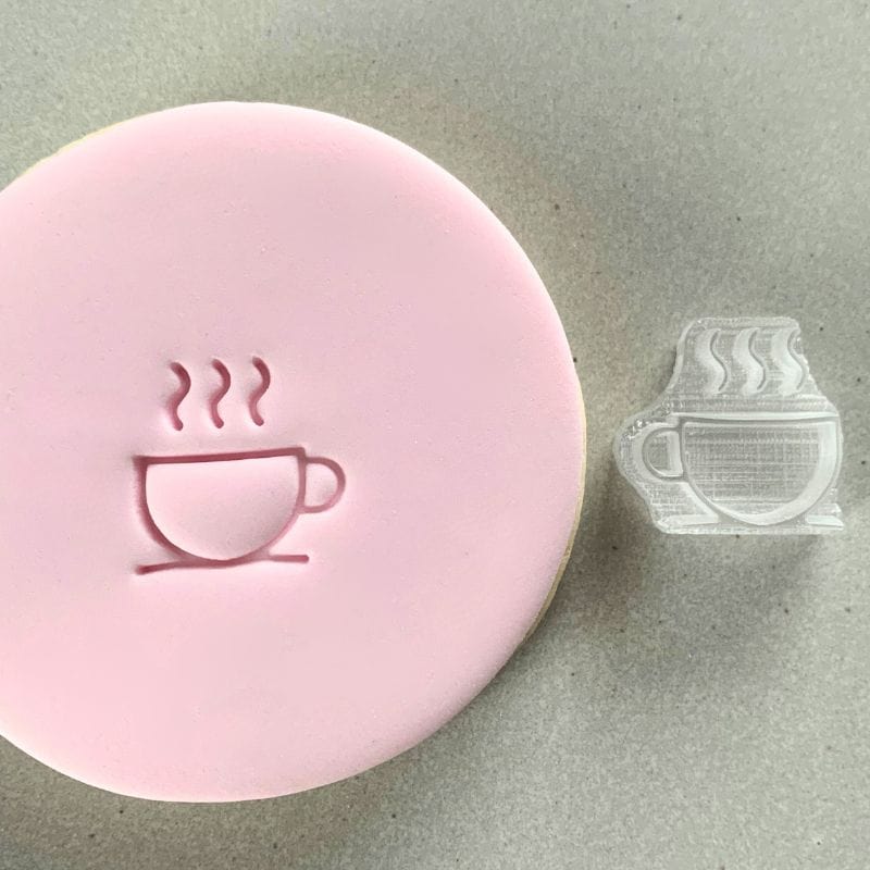 Mini Hot Cup Cookie Stamp used to create decorated fondant cookie