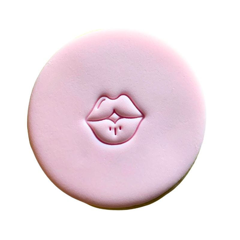 Mini Lips Cookie Stamp creating cute lips design on fondant.