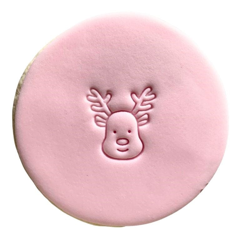 fondant cookie with Merry Christmas reindeer stamp design