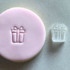 Mini Present Cookie Stamp used to create decorated fondant cookie