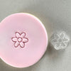 Mini Simple Flower Cookie Stamp used to create decorated fondant cookie.