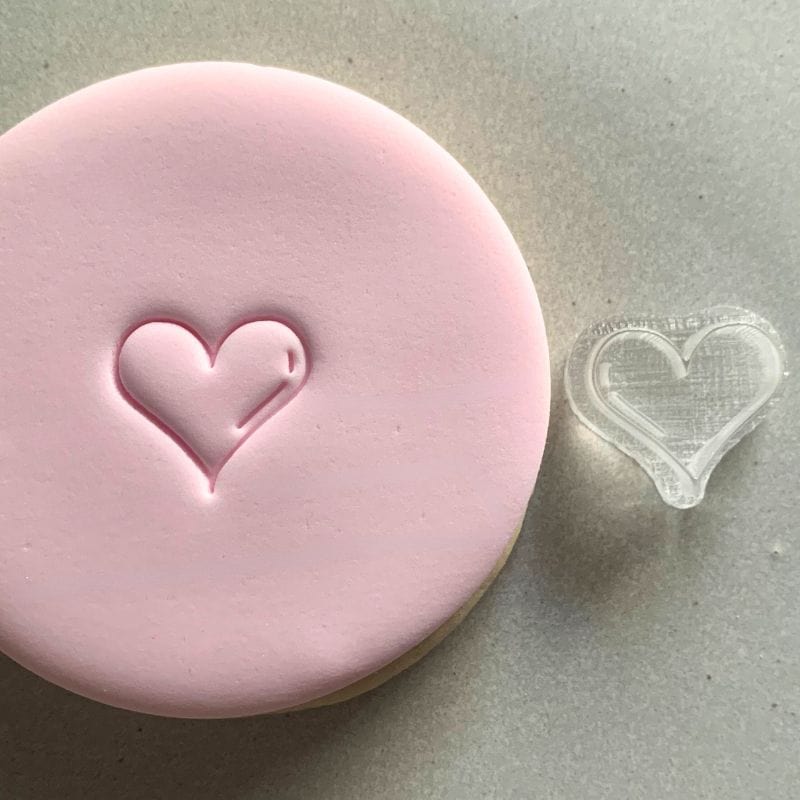 Mini Sweet Heart Cookie Stamp used to create decorated fondant cookie